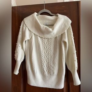 Classy and elegant off white cabled sweater
